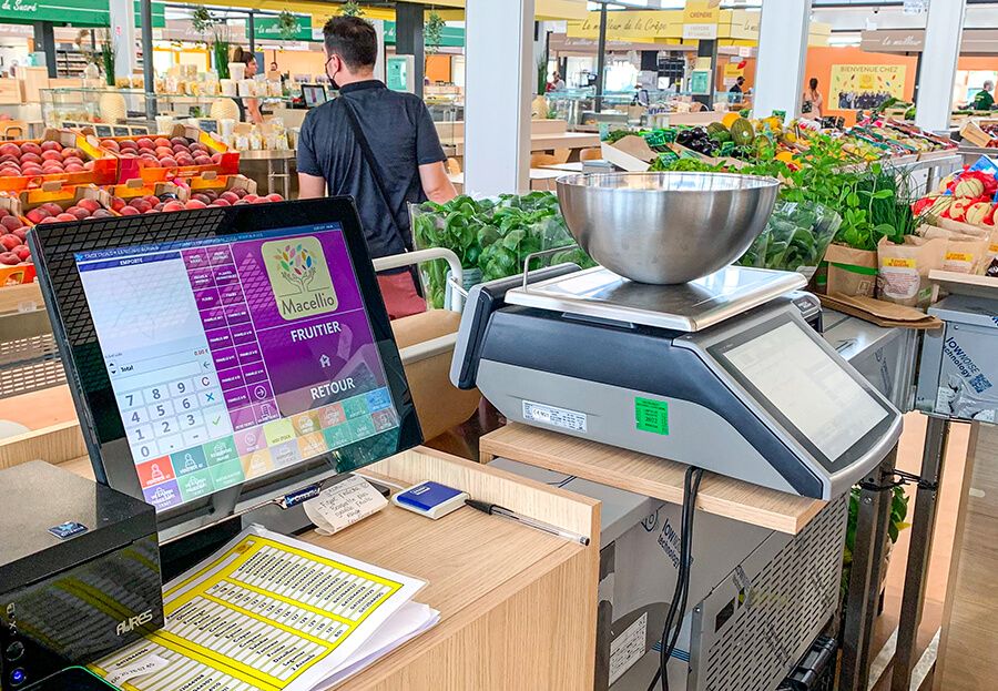 Installation caisse enregistreuse marché couvert Macellio