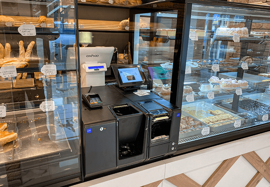 Installation monnayeur automatique boulangerie Au Bon Pain